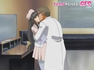 Medical man is kisses his nurse before she takes